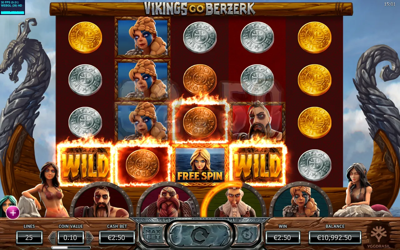Two flaming WILD tiles and a Free Spin scatter on the bottom row